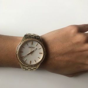 Vintage DKNY gold ladies watch w/yellow diamonds